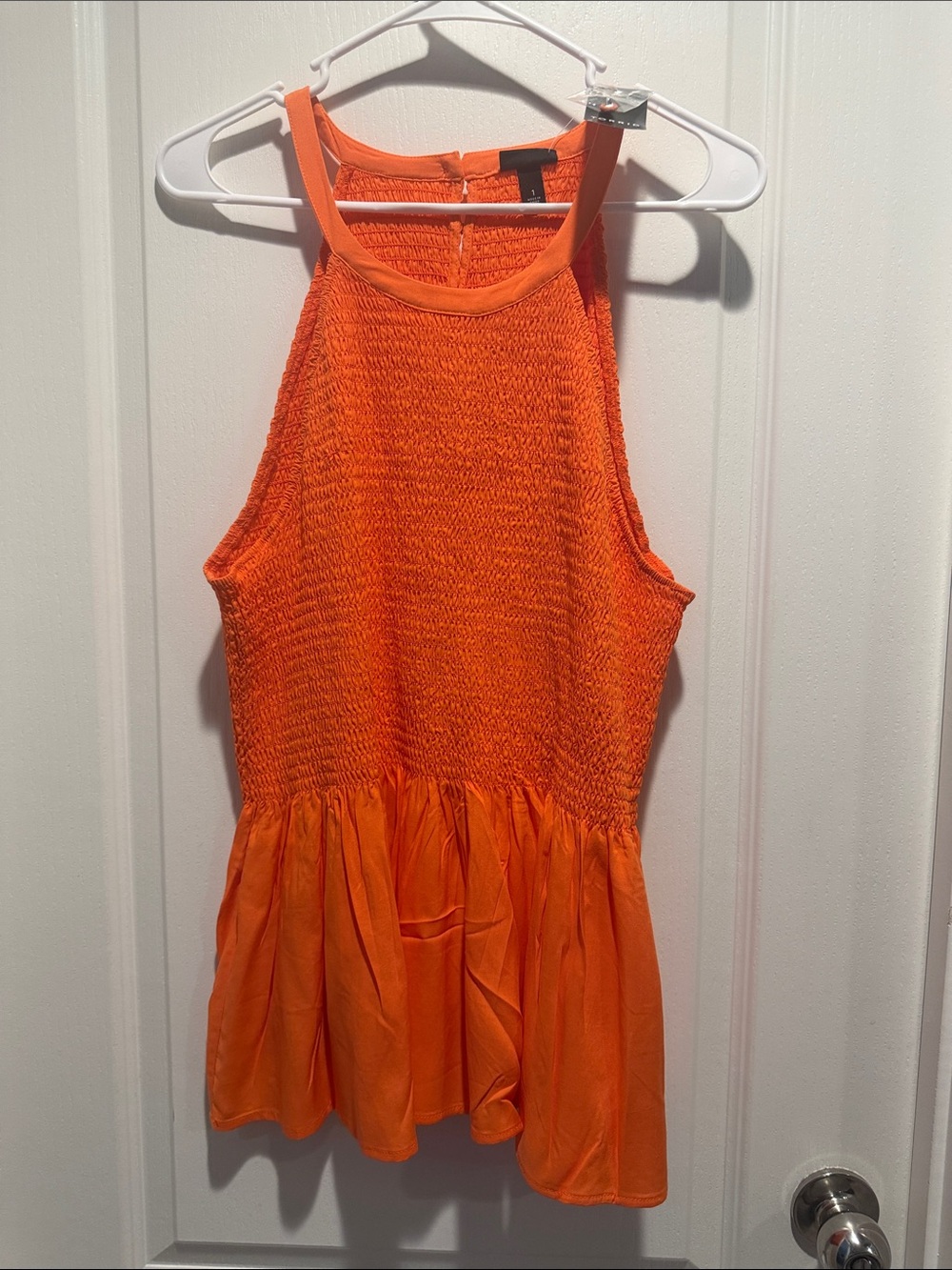 Women’s  ' Bright Orange Sleeveless Smocked peplum top